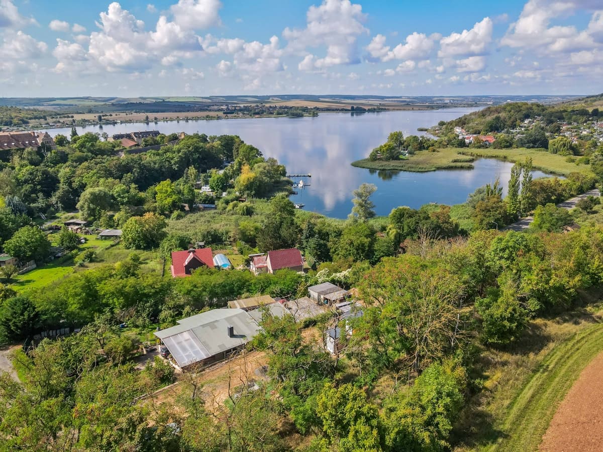 Traumgrundstück in Seeburg – genehmigte Bauvoranfrage für Wohnbebauung & unverbaubarer Seeblick!