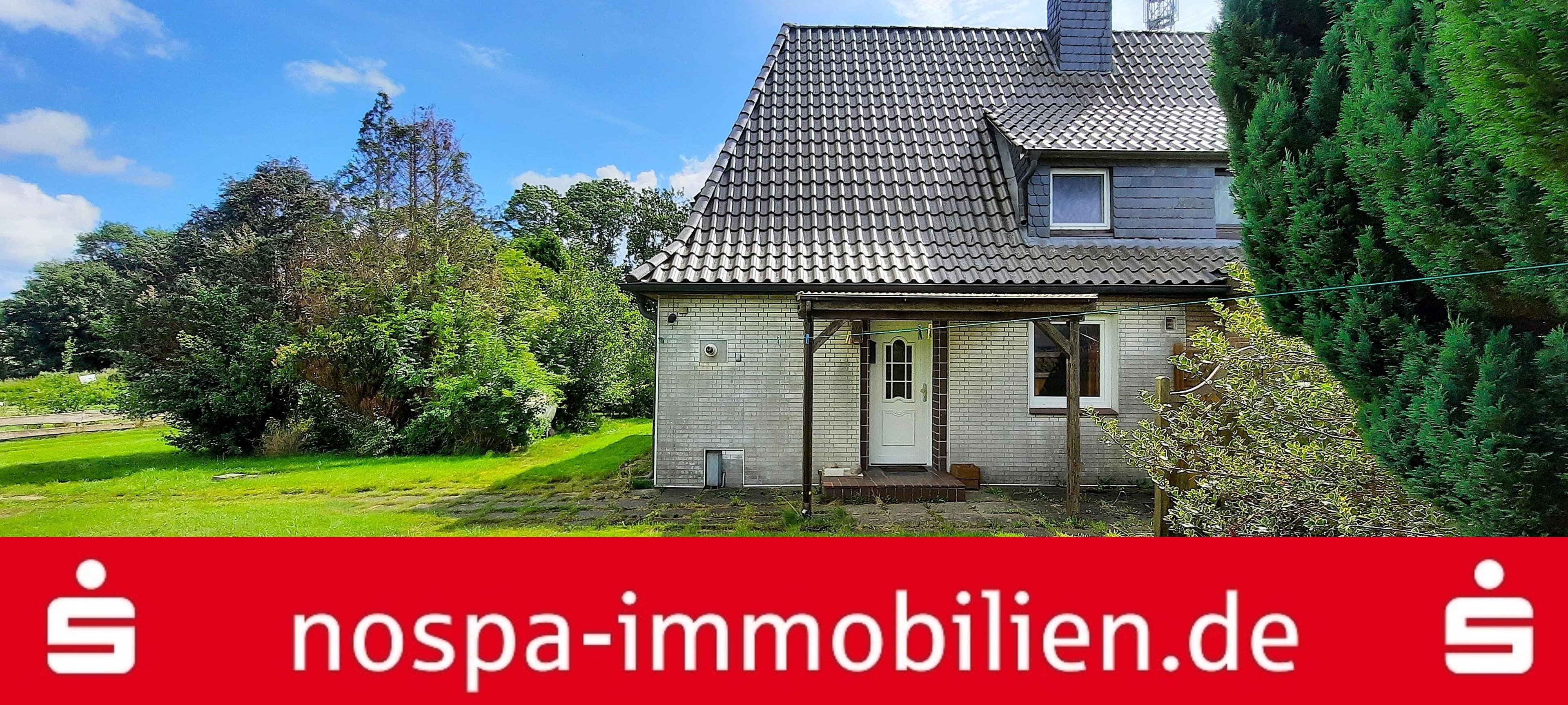 Doppelhaushälfte mit Garage, Gartenlaube und großem Grundstück!
