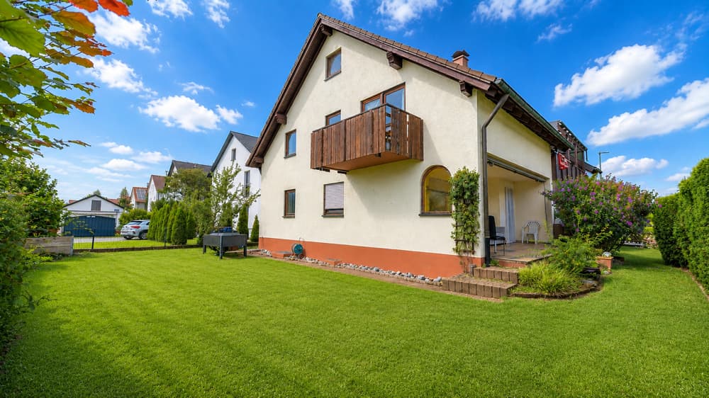 Wohnen auf zwei Etagen mit großzügigen Garten