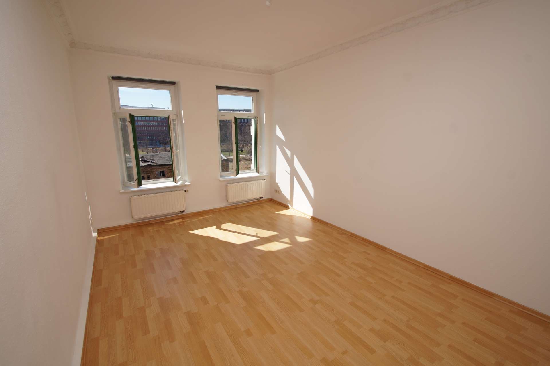 Preisattraktiv & vermietet: 3-Zimmer-Erdgeschosswohnung mit Balkon in guter Lage von Leipzig