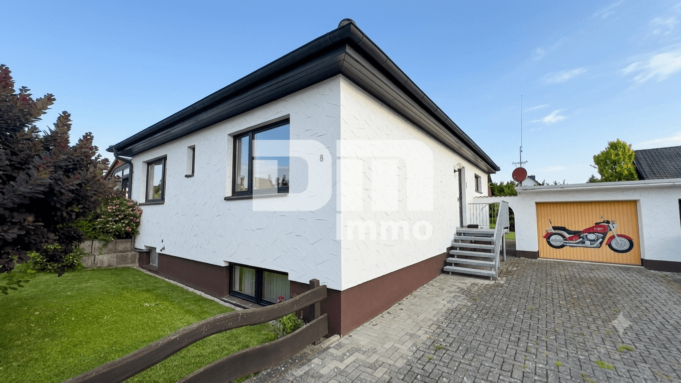 Solider Familien-Bungalow mit großem Potenzial in ruhiger Lage mit Wintergarten und Garage