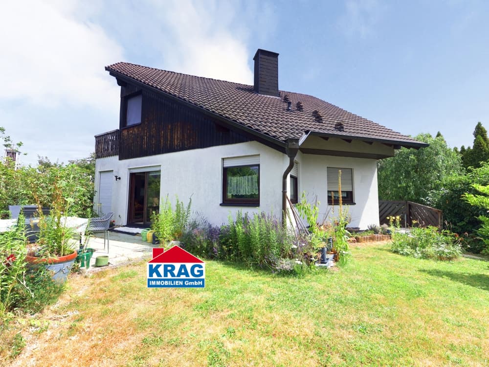 ++ KRAG Immobilien ++ Familienhaus mit großem Garten und zwei Wohnebenen für neue Ideen ++
