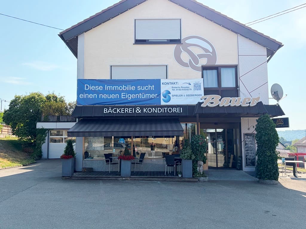 Wohnen, Arbeiten, Erweitern – Dreifamilienhaus mit Gewerbe & Baureserve