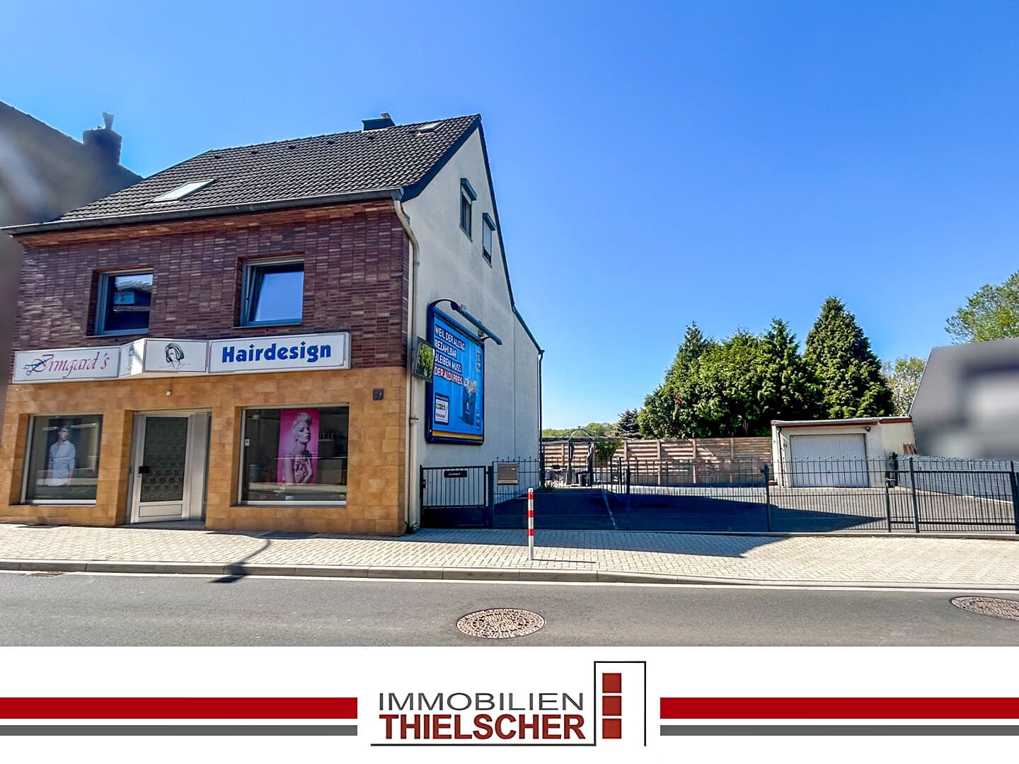 Wohn- und Geschäftshaus mit 2 Wohneinheiten, Garage und großzügigem Außenbereich