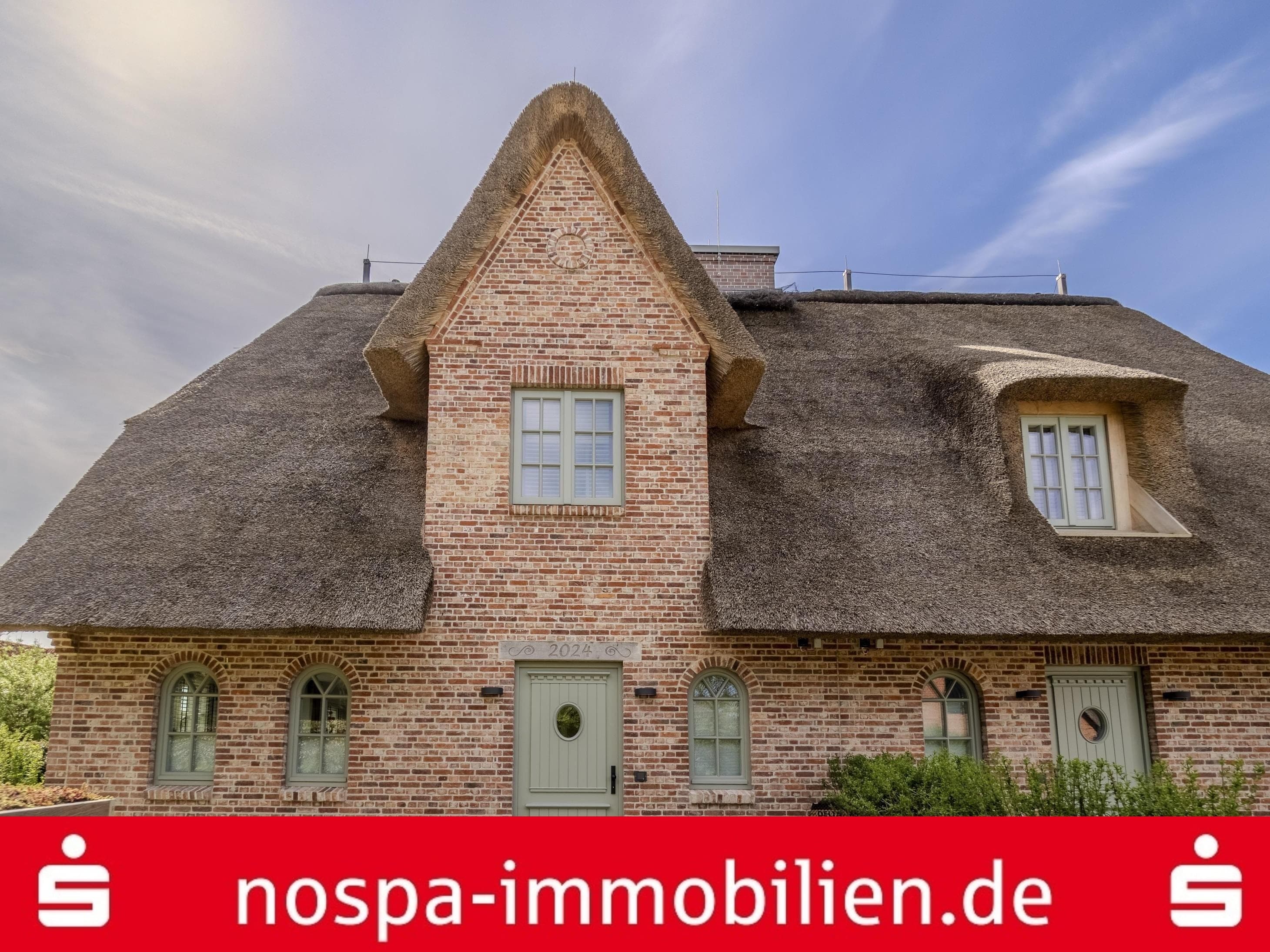 Neuwertig - Hochwertig ausgestattete, reetgedeckte Doppelhälfte im Süden von Westerland