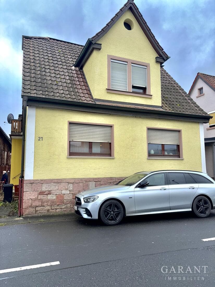 Gemütliches Einfamilienhaus mit Garten und Dachterrasse