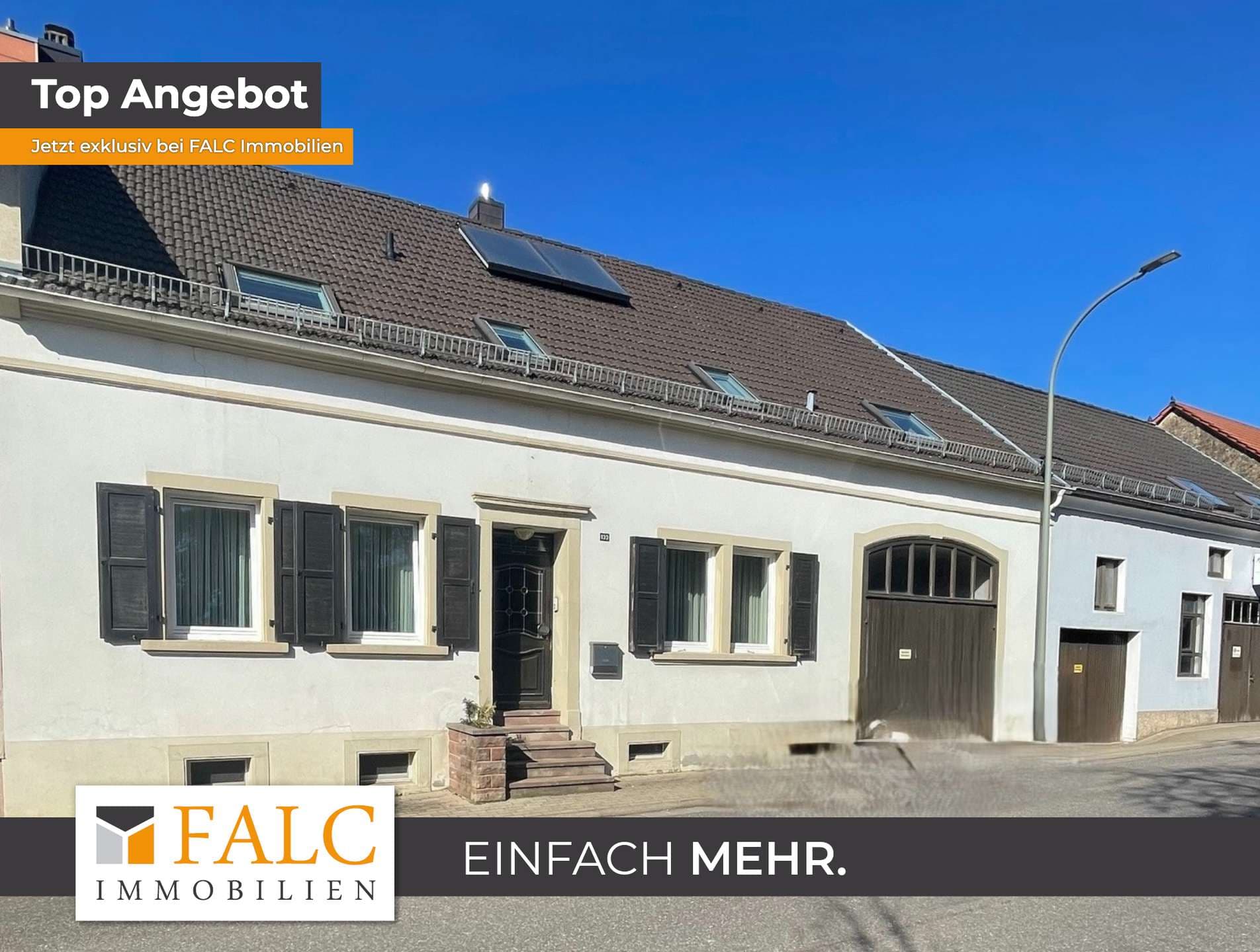 Zweifamilienhaus mit Halle, Werkstatt und Garagen