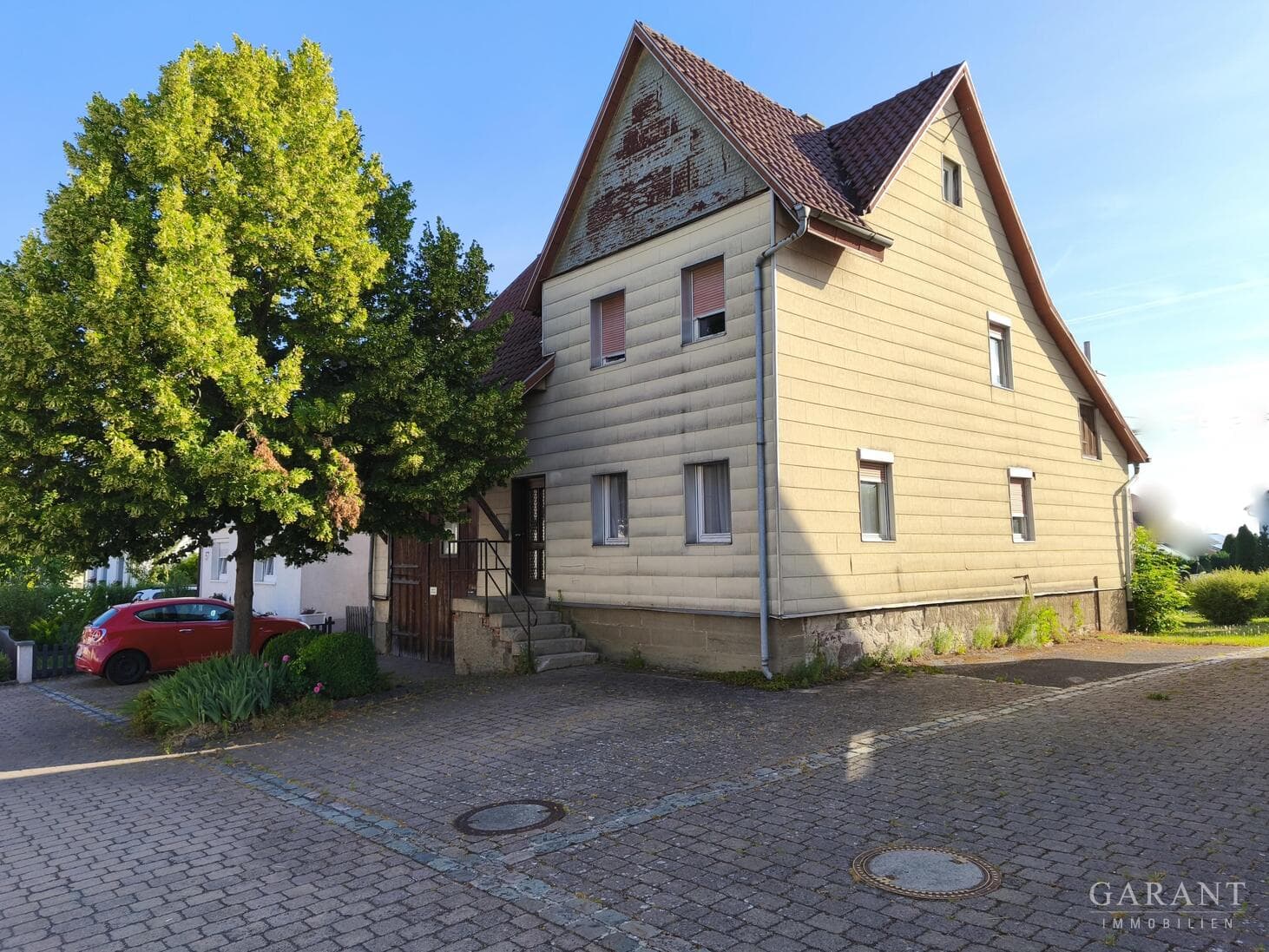 Grundstück mit Abrissgebäude in attraktiver Lage