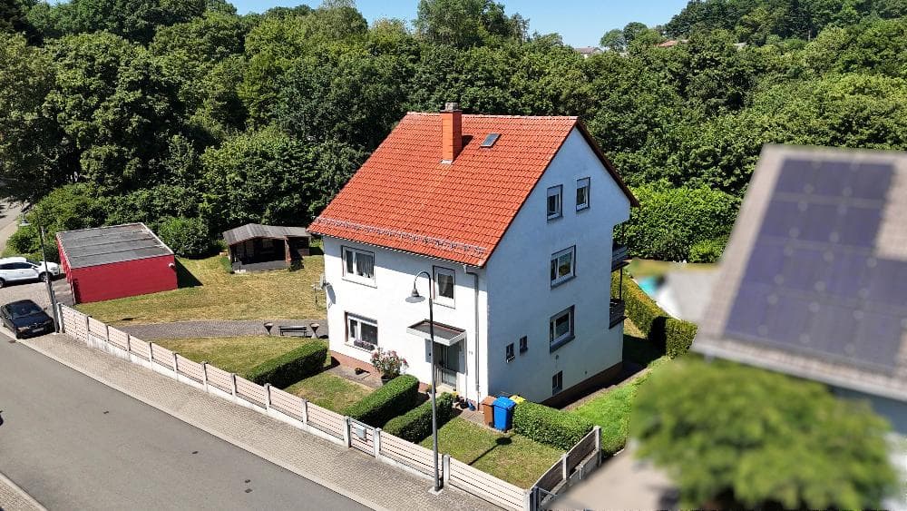 +++Gepflegtes Dreifamilienhaus mit großzügigem Grundstück, 5 Garagen und zusätzlichem Baupotenzial in ruhiger Wohnlage+++