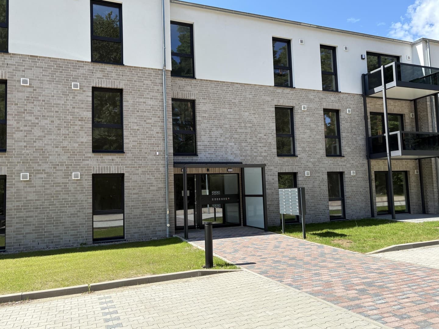 Erstbezug: Moderne Erdgeschosswohnung mit Terrasse sowie energieeffizientem Wohnkomfort