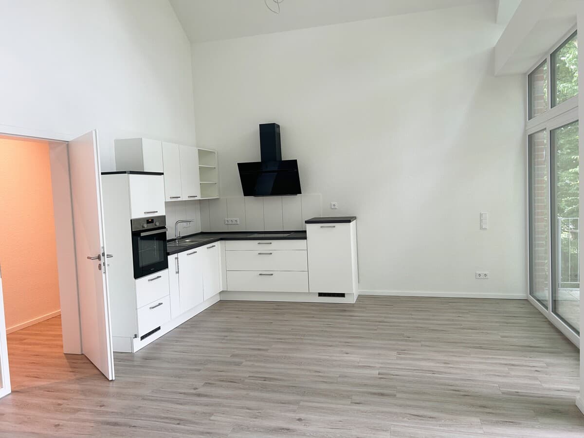 Große Obergeschosswohnung mit Balkon - KfW 40+