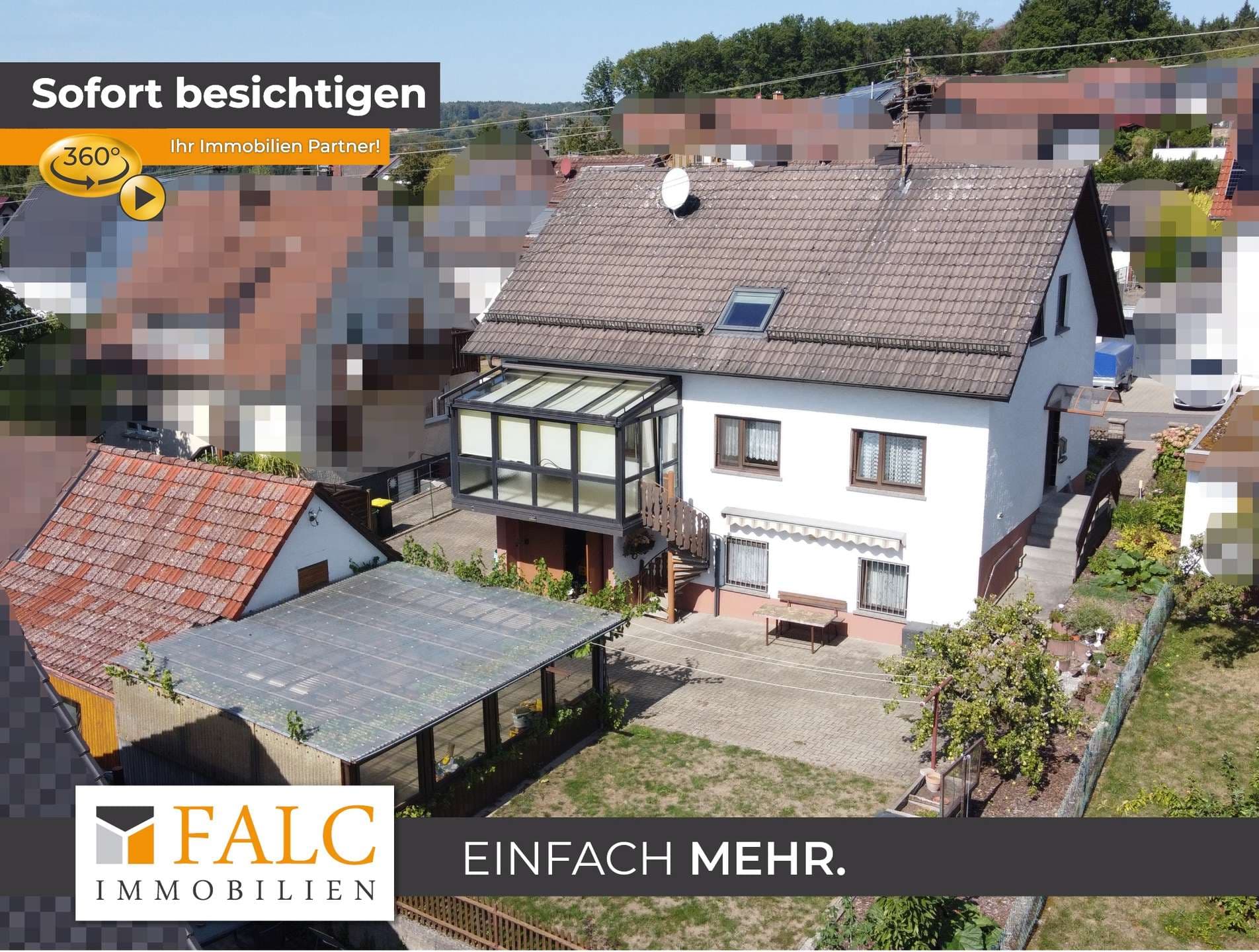Gepflegtes Zweifamilienhaus mit großzügigem Grundstück, Wintergarten und Garten