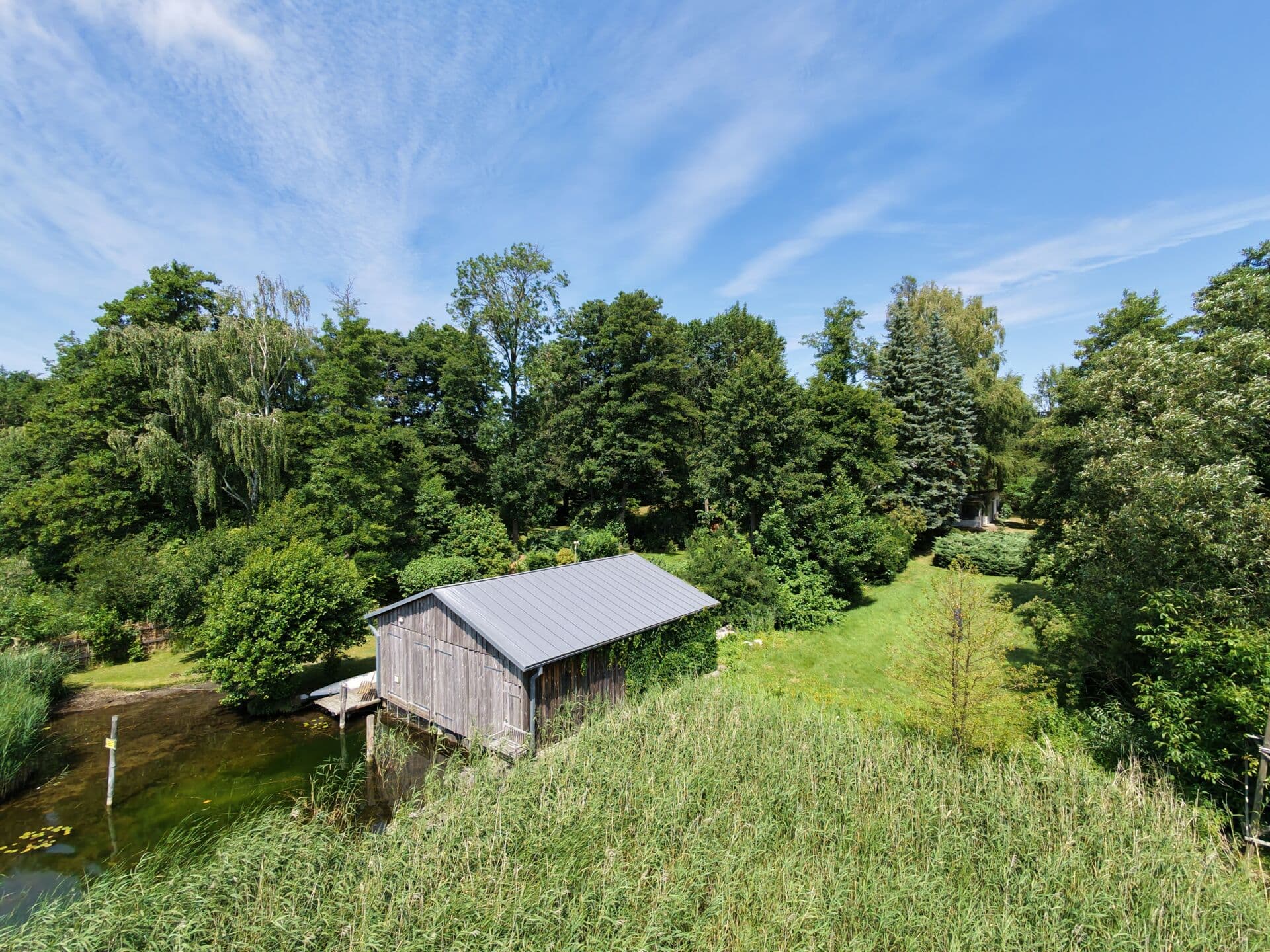Seegrundstück in Himmelpfort – mit 3 Fewos und Bootshaus, direkt am Stolpsee