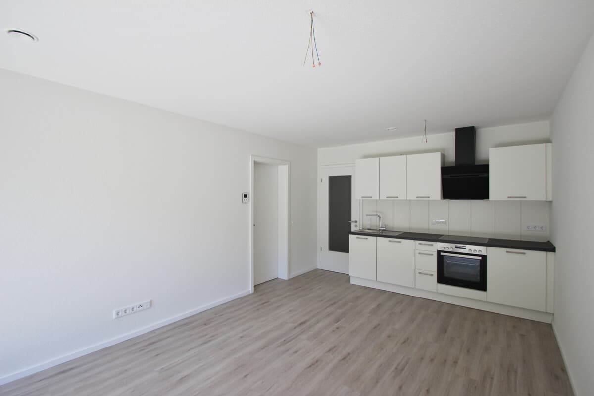Erdgeschosswohnung mit Terrasse, Garten und PKW-Stellplatz