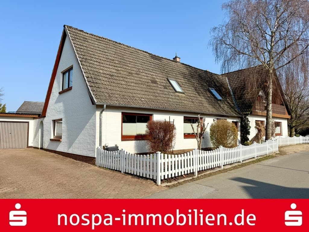 Teilweise vermietetes Wohnhaus mit 2 Wohneinheiten: Ideal für Eigentümer und/oder Anleger