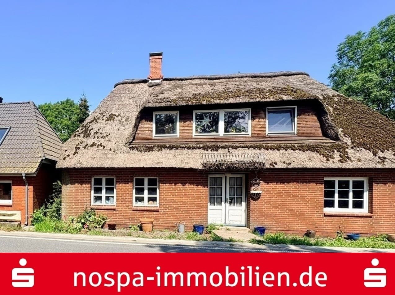 Einfamilienhaus mit Einliegerwohnung unter Reet!