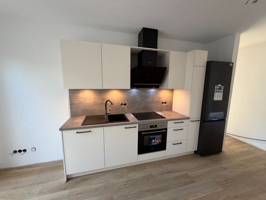 Erstbezug | Modernes Neubau-Apartment mit großem Balkon | KfW 40 | Einbauküche | Geothermie