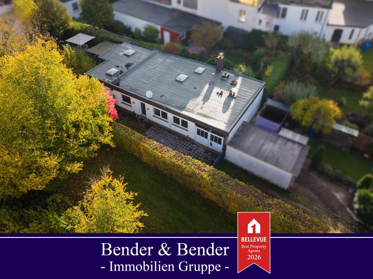 Sanierungsbedürftiger Bungalow mit Werkstatt in zentraler Wohnlage!