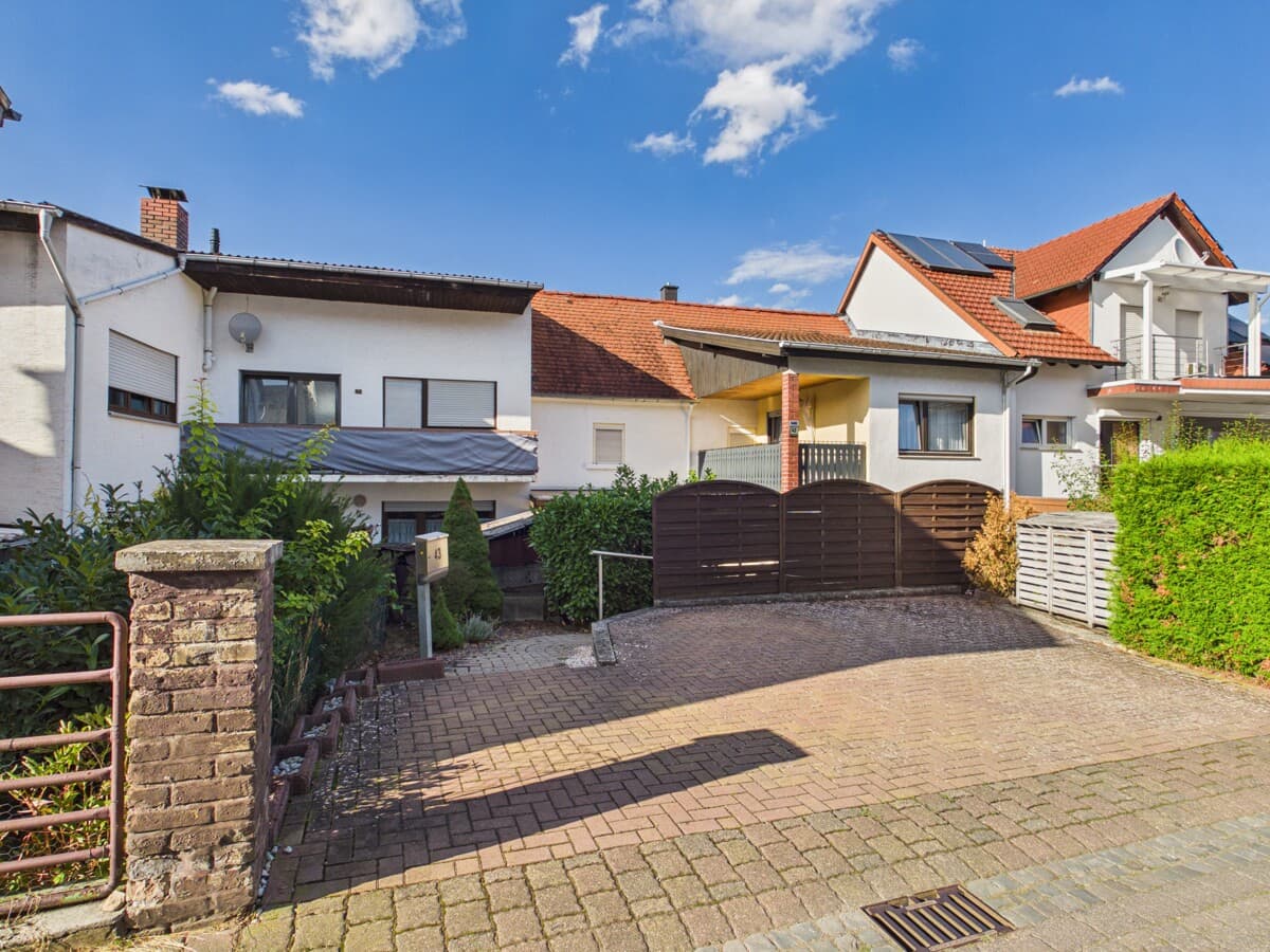 Kleines Haus mit vielfältigen Aufteilungsmöglichkeiten und pflegearmem Grundstück mit Süd-Garten