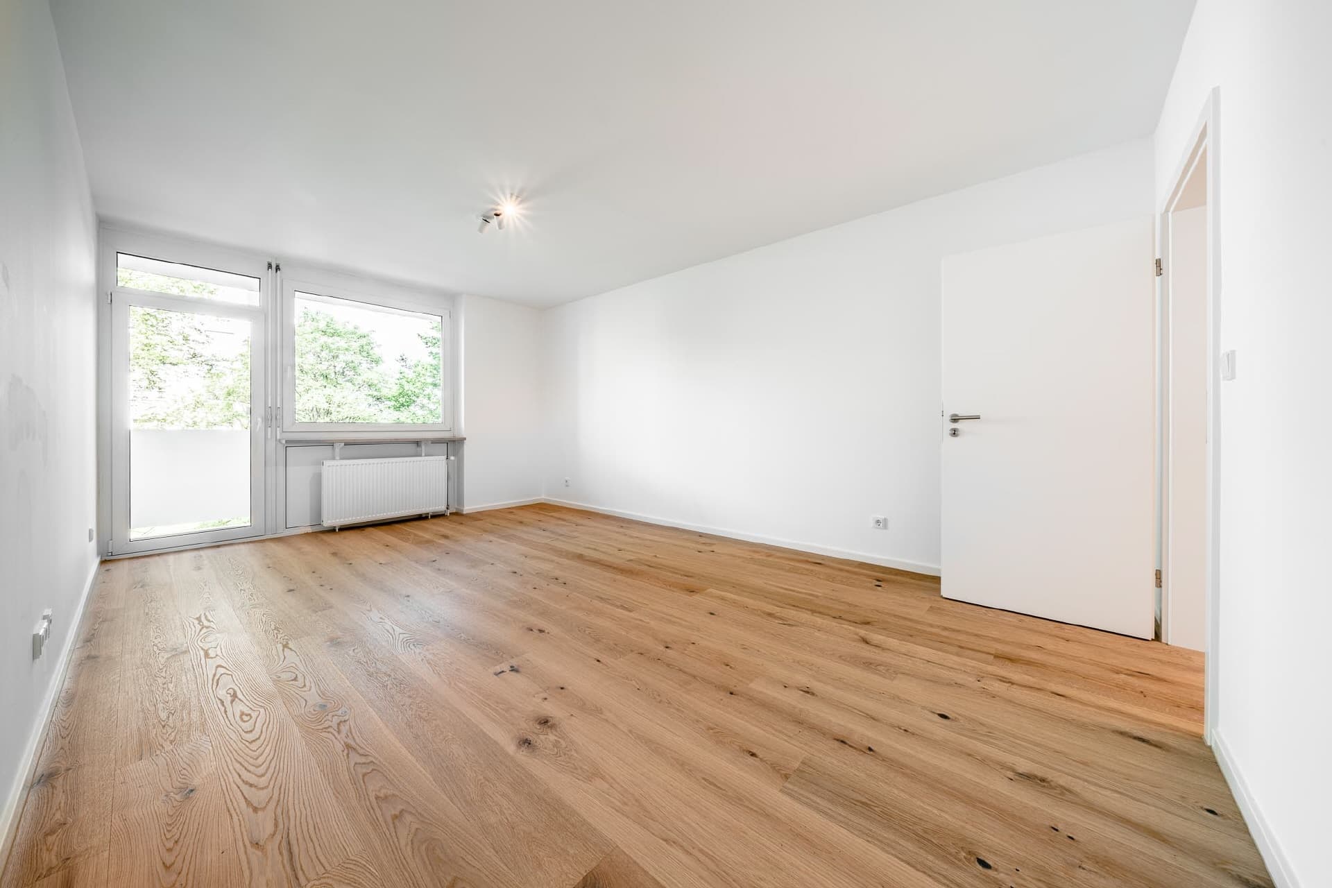 AIGNER - Hochwertig sanierte 3-Zimmer-Wohnung mit West-Loggia und modernem Wohnkomfort