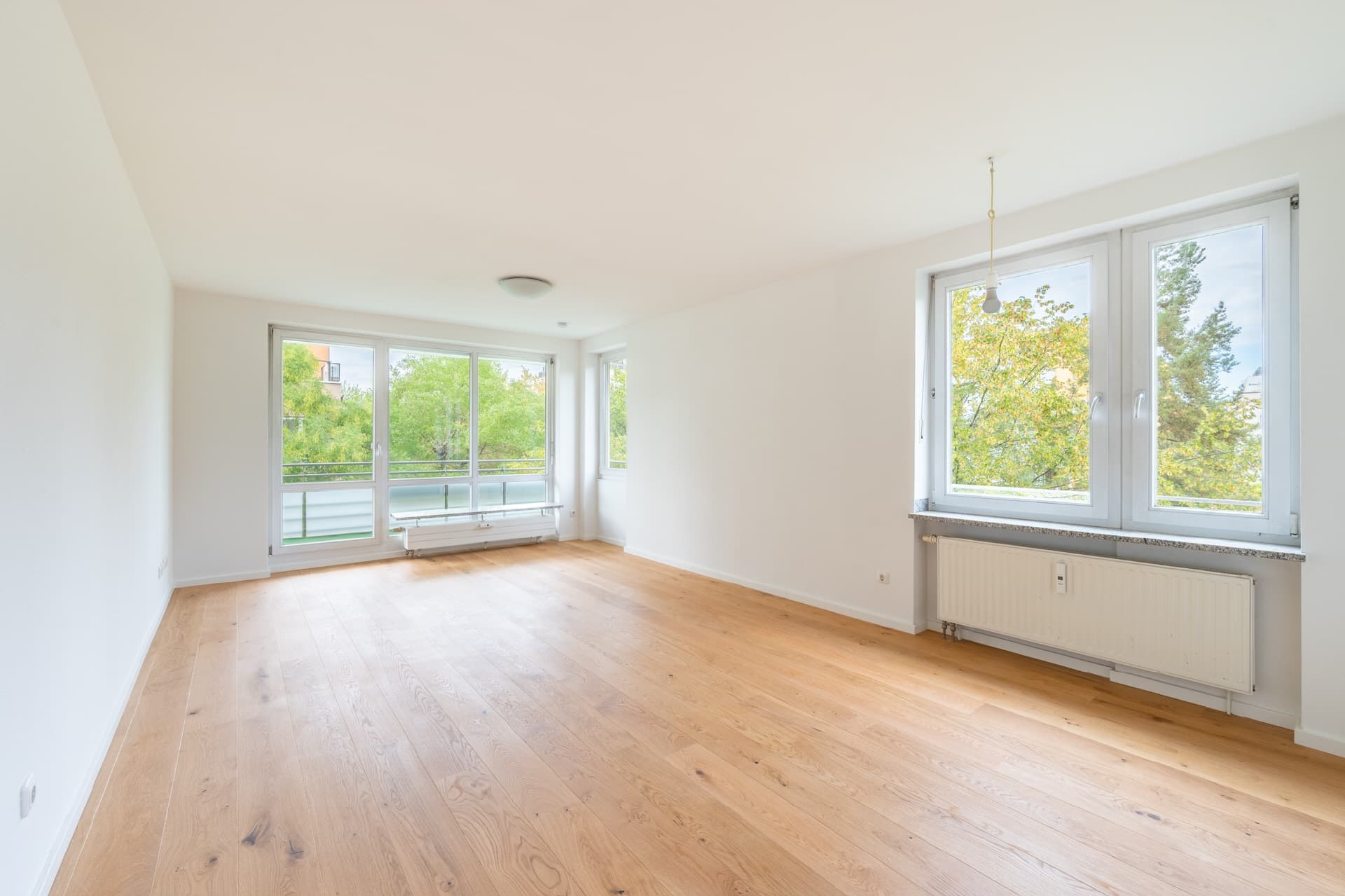AIGNER - Ruhig gelegene 4-Zimmer-Wohnung mit optimalem Grundriss und Balkon zum grünen Innenhof