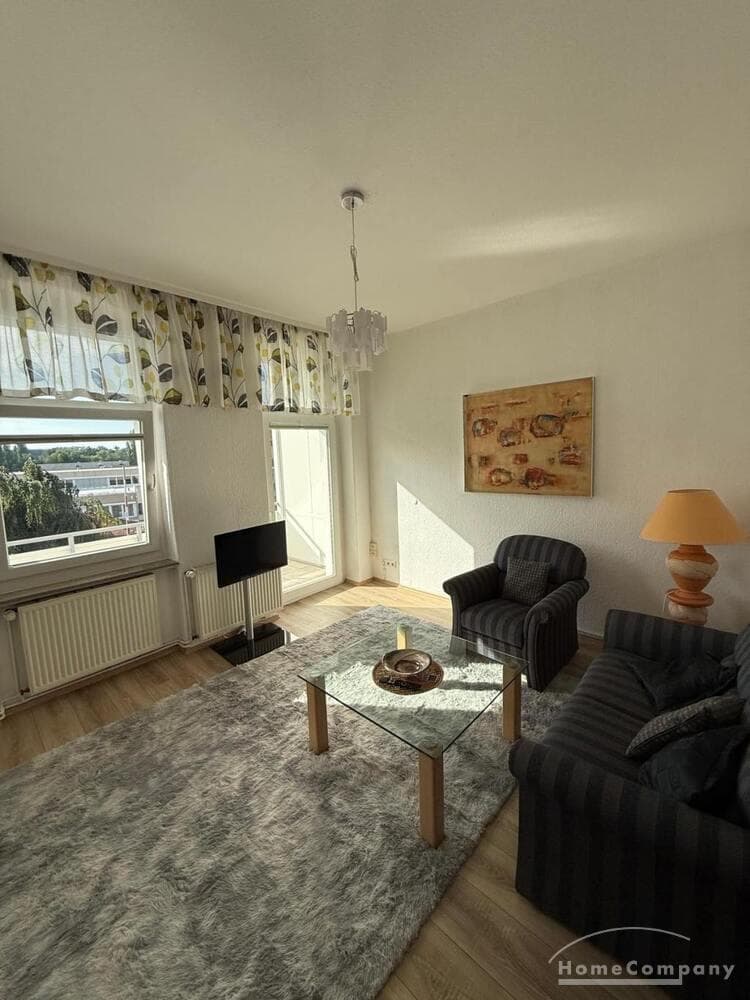 Schöne, gemütliche 2 Zi.-Wohnung, möbliert, mit Balkon Richtung Westen, PKW-Stellplatz.