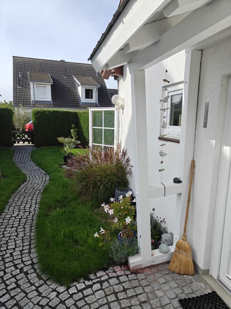 Galerie-Wohnimmobilie mit kleinem geschützten Garten auf Eigenland - provisionsfrei