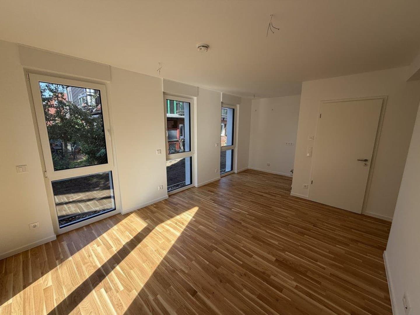 Dein neues Zuhause im Grünen: 2-Zimmer-Neubauwohnung mit Garten