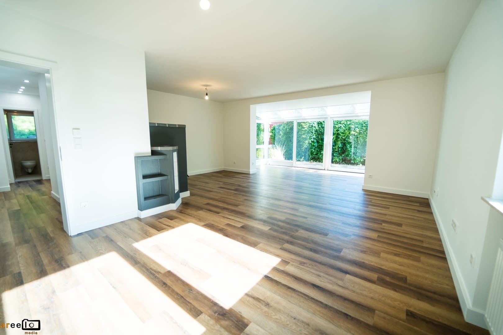 Wohnen mit Wohlfühlfaktor: 136 m², eigener Garten, Garage, Terrasse, Wintergarten & Kachelofen