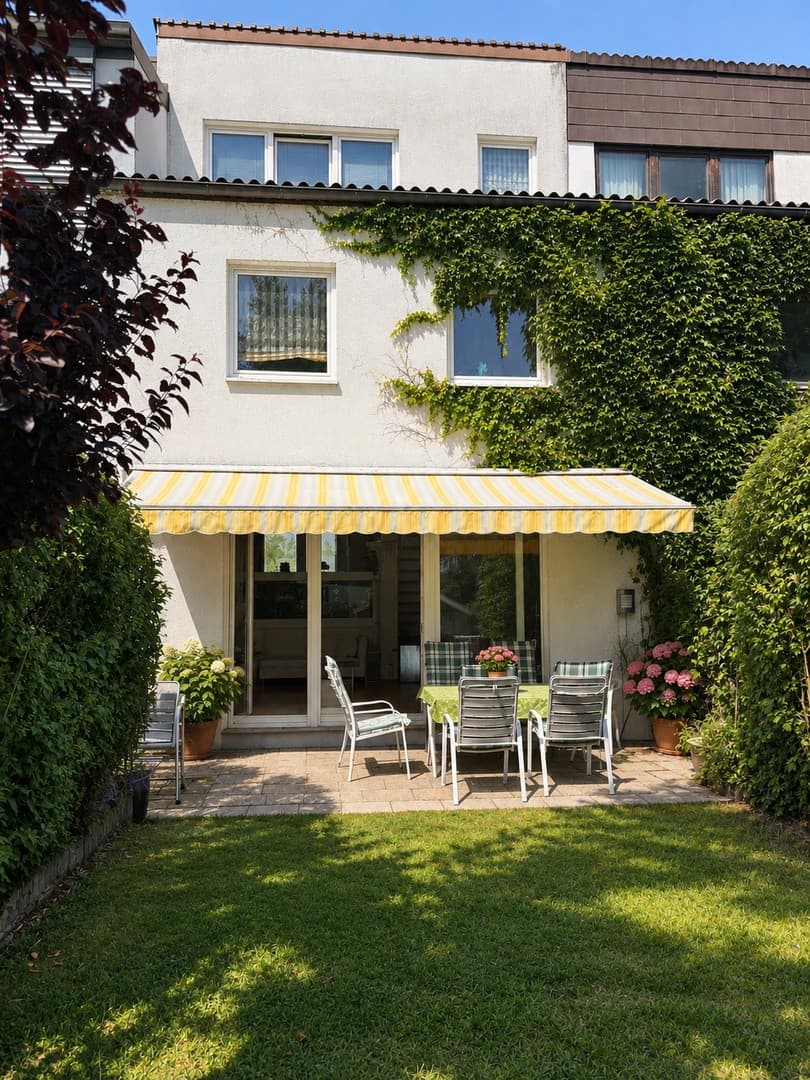 Gepflegtes Reihenmittelhaus mit Dachstudio, Südgarten und flexibler Raumaufteilung