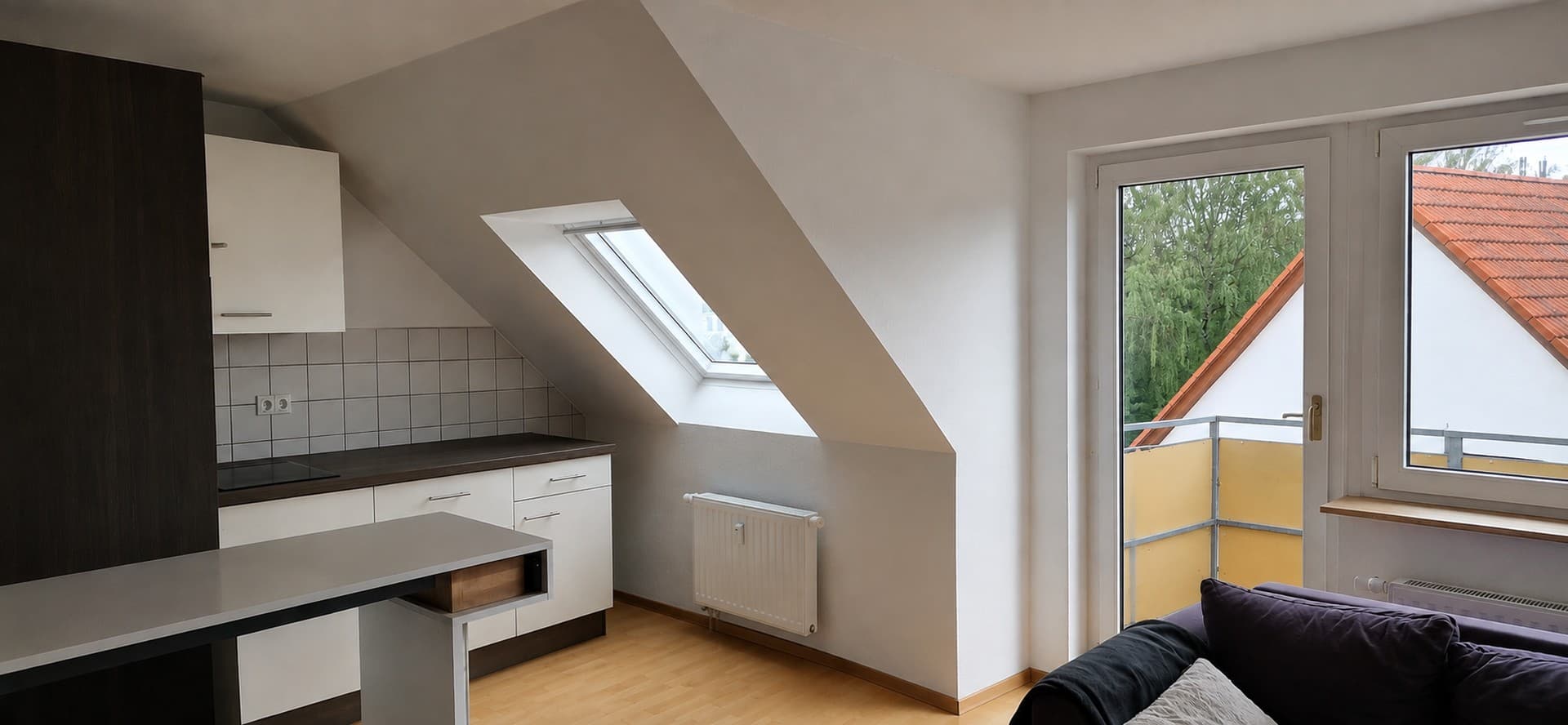Attraktive Dachgeschosswohnung mit Balkon, Stellplatz und zusätzlichem Dachboden