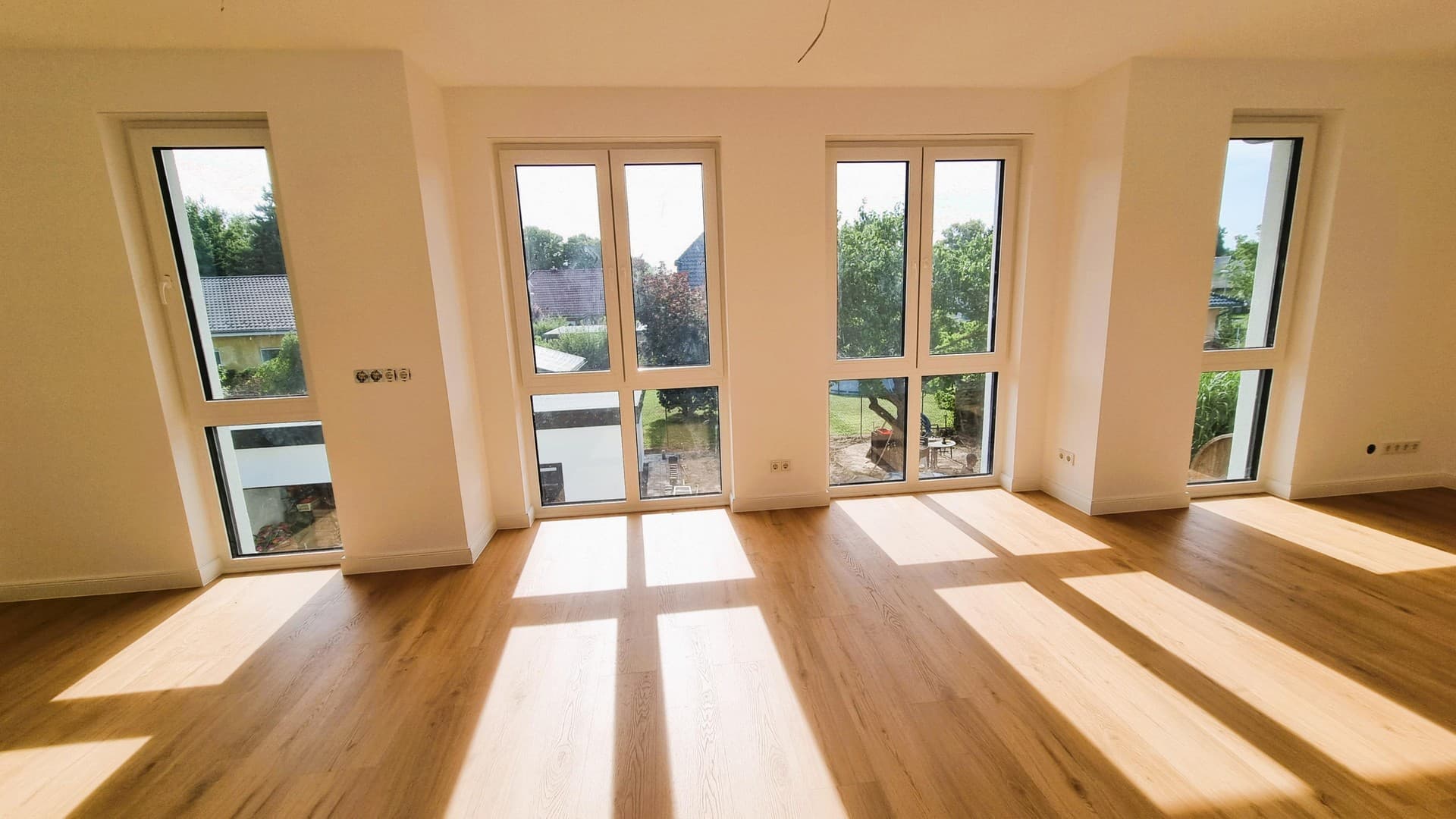 Erstbezug im Grünen: Exklusive 3,5-Zi.-Wohnung mit Premium-EBK & privatem Garten