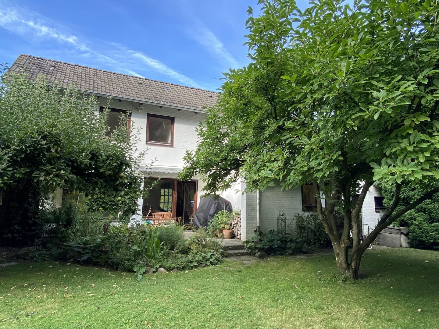 Oase in der Stadt – Einfamilienhaus mit Parkblick