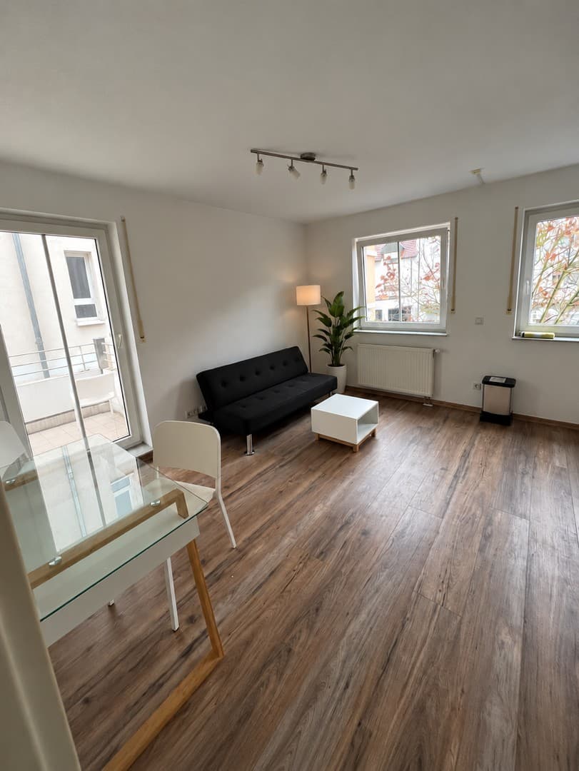 Stilvoll möblierte 2-Zimmer-Wohnung mit Balkon in zentraler Innenstadtlage inkl. TG-Stellplatz