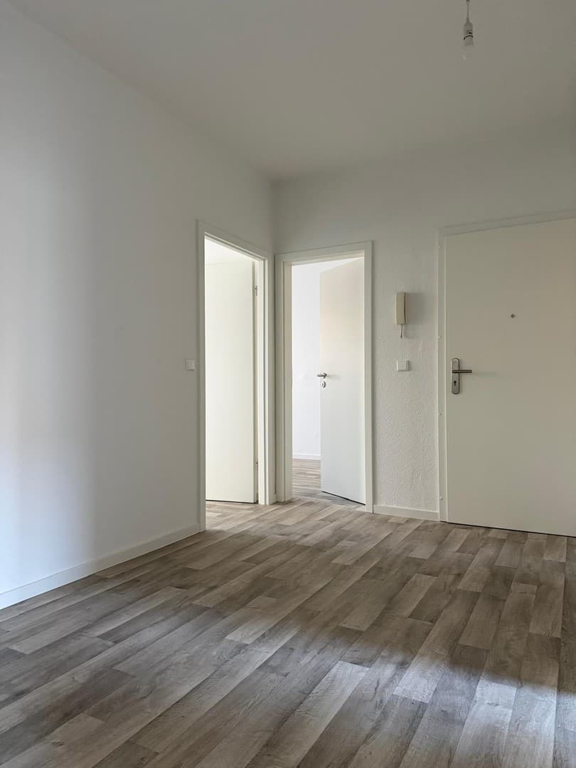 Erstbezug nach Sanierung – moderne 4-Zimmer-Wohnung mit Balkon und Blick ins Grüne