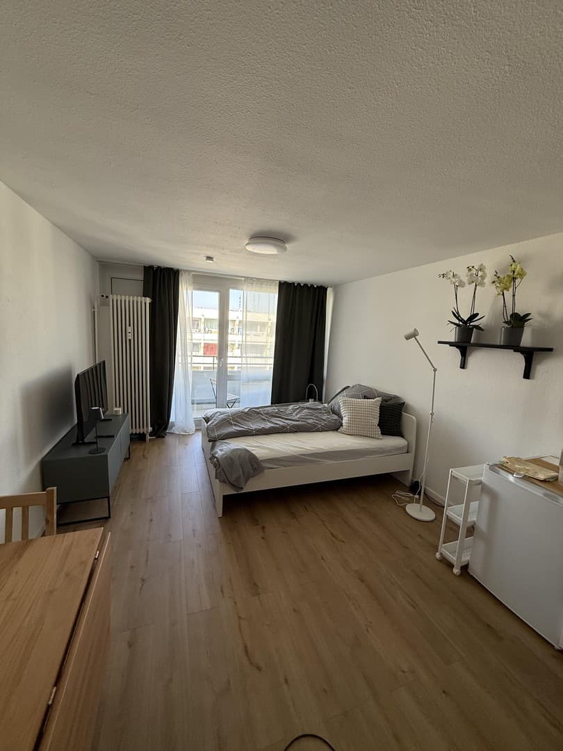 Stilvolle 1-Zimmer-Wohnung mit gehobener Innenausstattung mit Balkon und EBK in München Berg am Laim