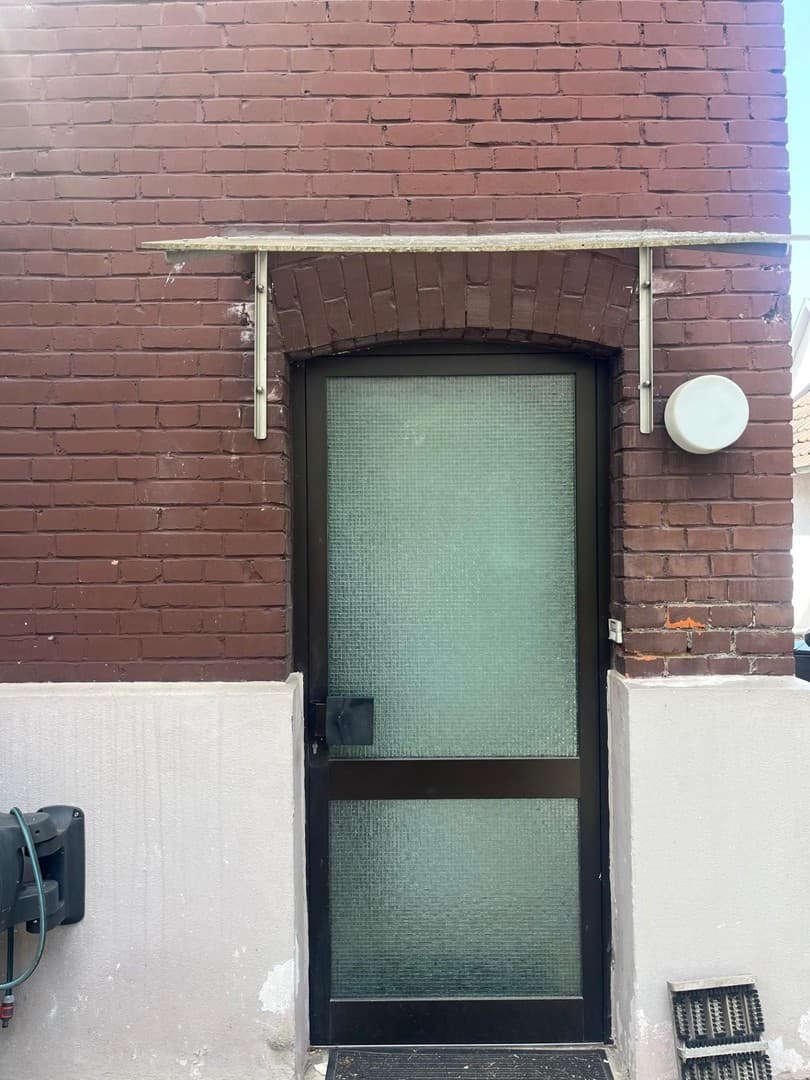 Zweifamilienhaus mit Garten mitten in der Stadt