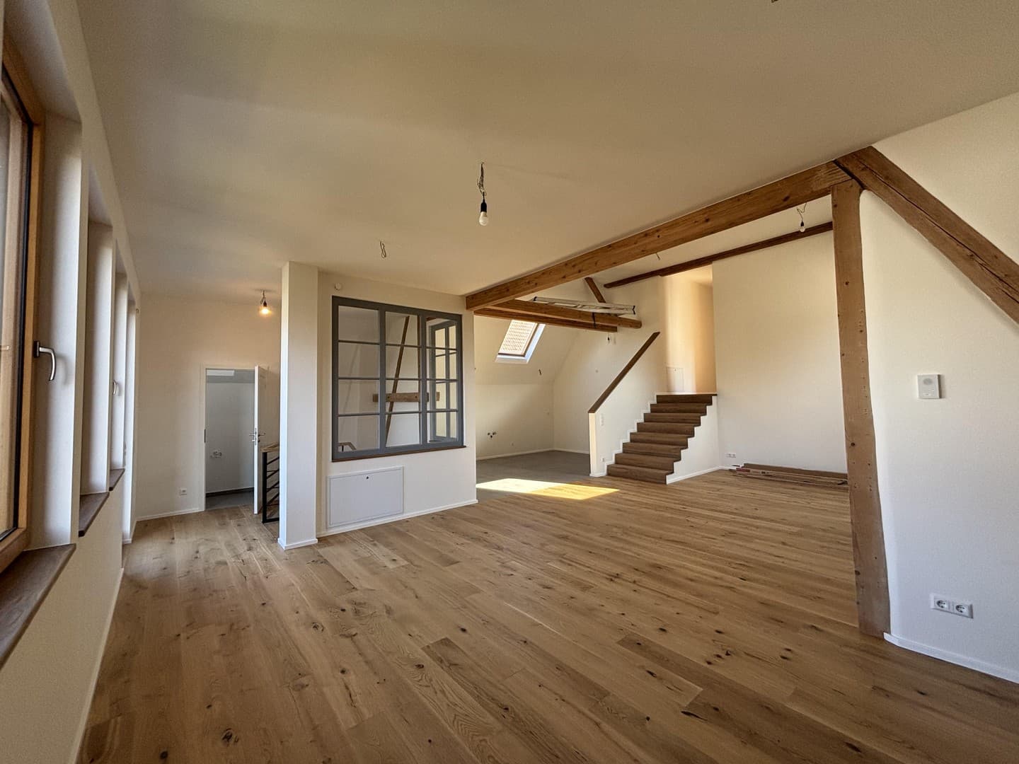 Einzigartiges Wohnen – Loftwohnung mit sonnigem Balkon & eigenem Garten