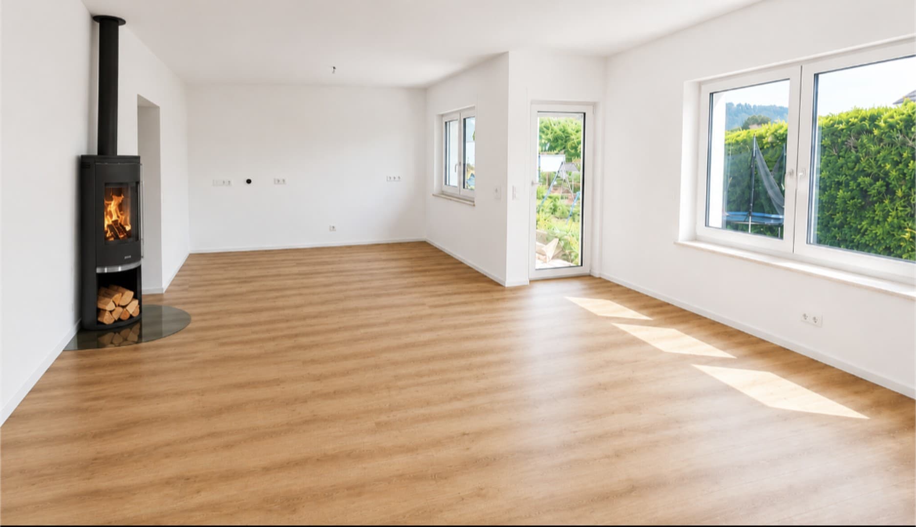 Erstbezug 2 Zimmer Wohnung mit eigenem Garten und Garage
