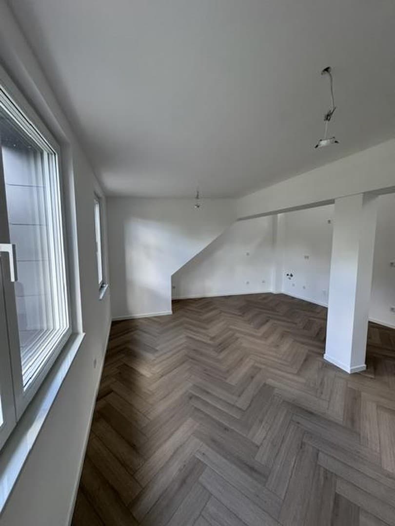 Exklusive 2,5-Zimmer-DG-Neubauwohnung (5 % AfA) in Dortmund – Wärmepumpe & Erstbezug