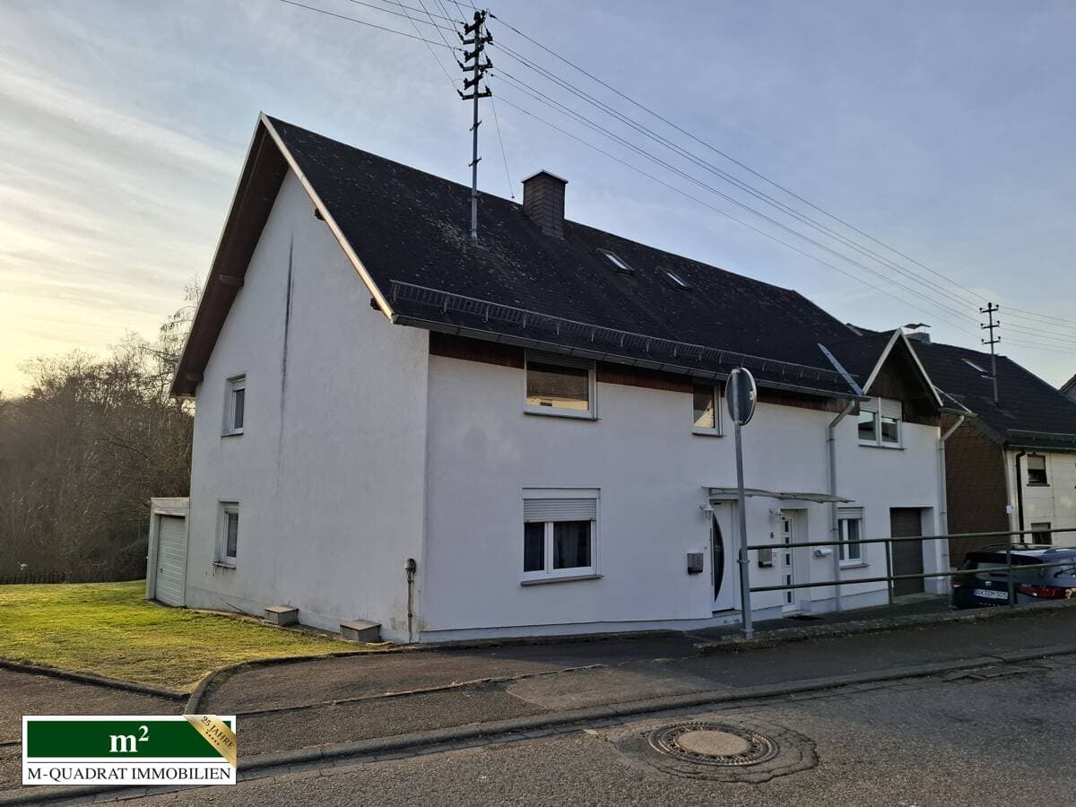 Saniertes und gepflegtes Dreifamilienhaus mit Wintergarten