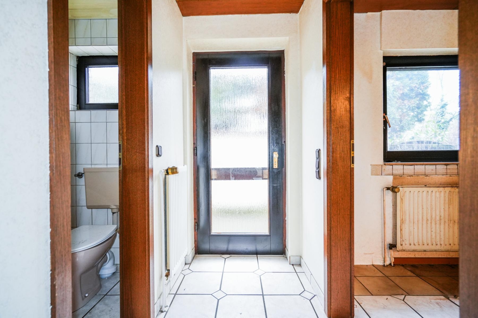 Immobilie in Kamp-Lintfort - Familienfreundliches Reihenmittelhaus in ruhiger Lage nahe Pappelsee mit Südgarten und Carport - Bild 2