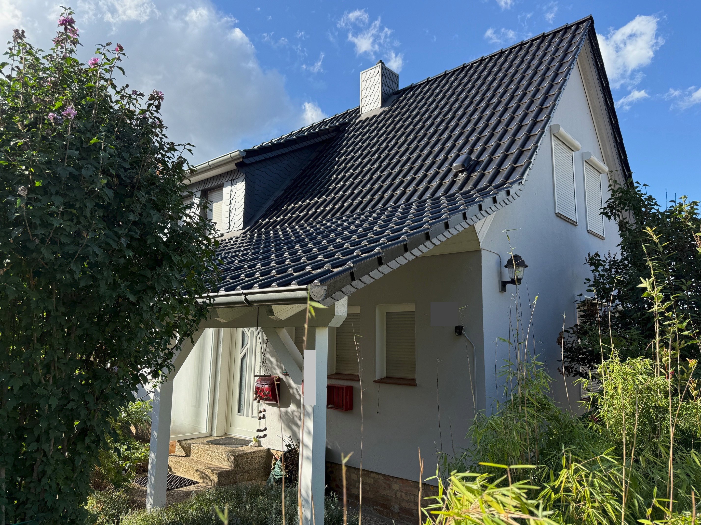 Gemütliche Doppelhaushälfte mit Garage und Gartenteich in Schöningen – Schöningen – Bild 1 von 9