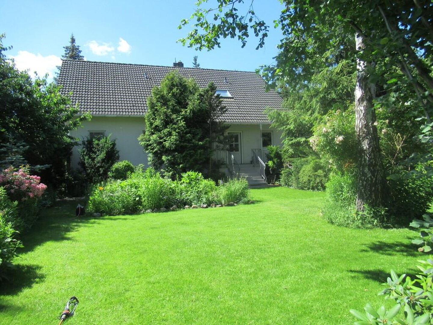 Zweigenerationenhaus in Weststaaken mit separaten Eingängen - großer naturnaher Garten