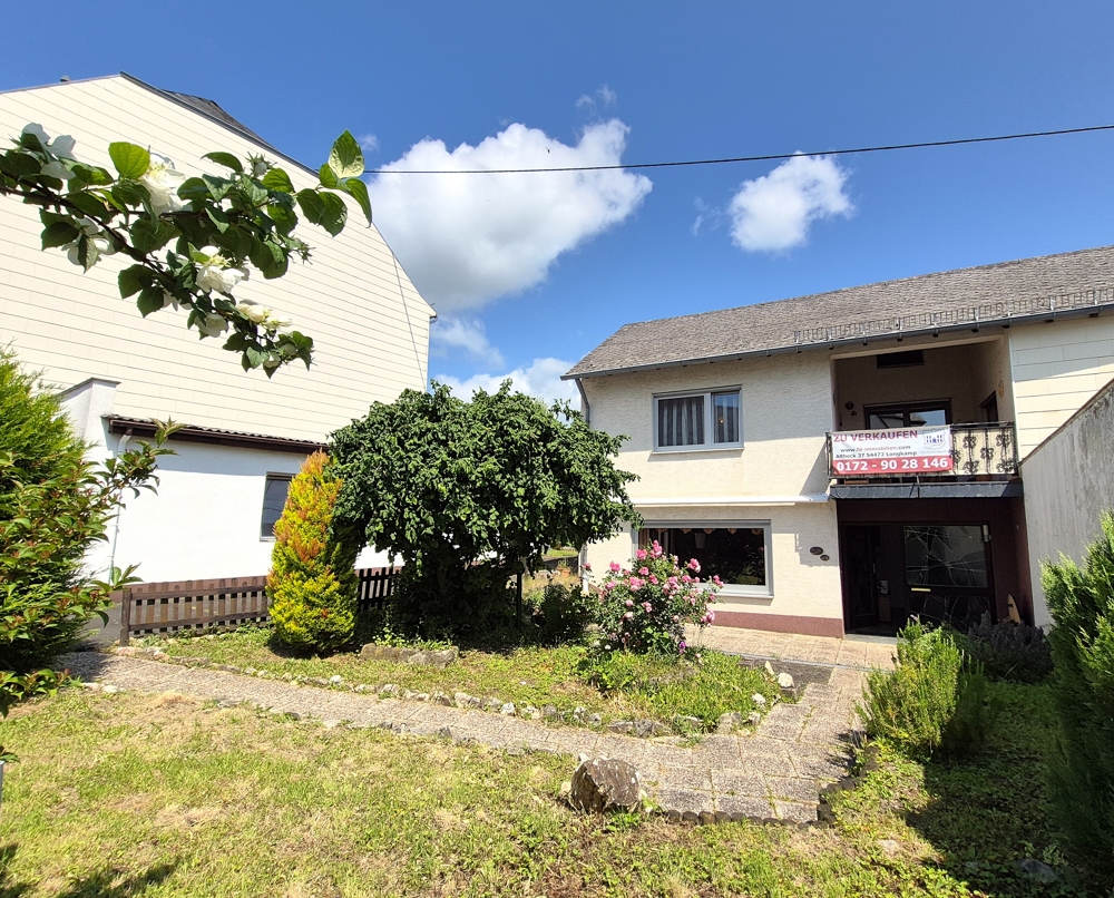 TOP-Preis-Leistungs-Verhältnis! Gepflegtes Wohnhaus mit Garten und Garage! – Longkamp – Bild 1 von 22
