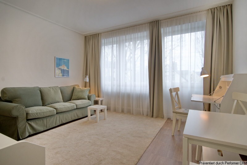 Schöne, möblierte 2-Zimmer-Wohnung, Tiefgaragenstellplatz und Internetzugang optional