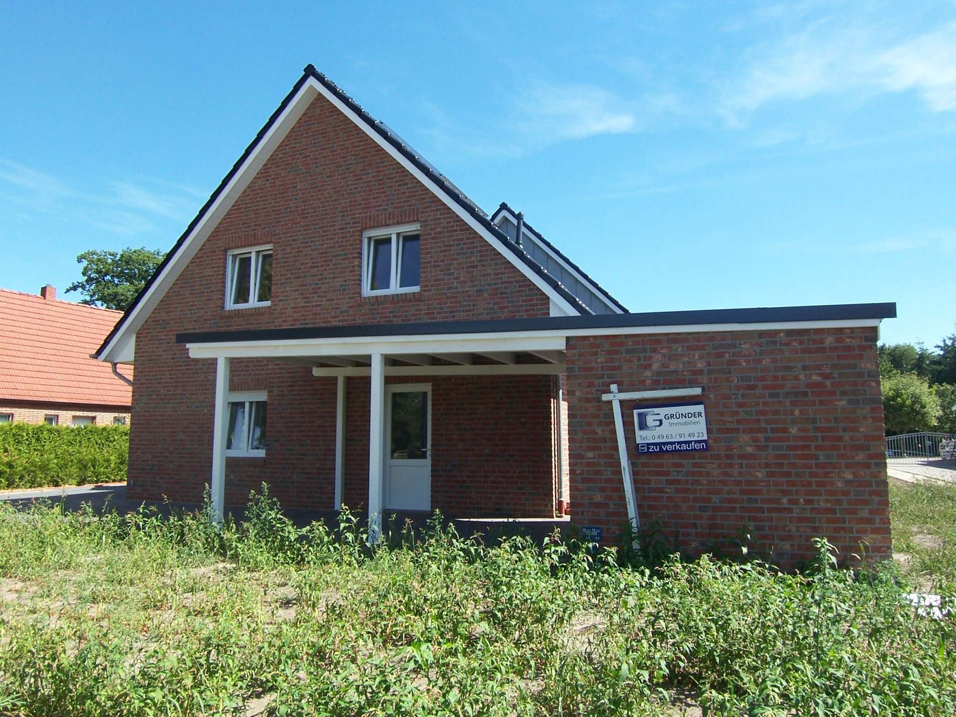 Immobilie in Walchum - Hochwertige Neubau-Doppelhaushälfte in toller Wohnlage - Bild 1