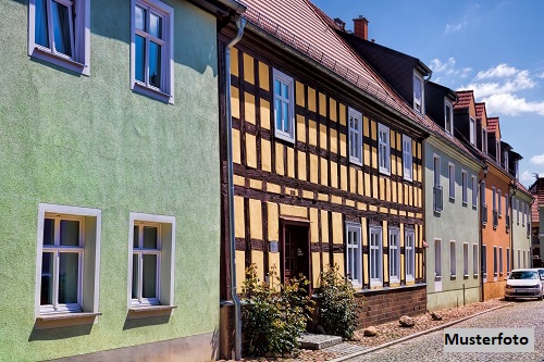 Immobilie in Steinhagen - Familienfreundliches Reihenmittelhaus mit sonnigem Balkon, Garten und Garage - Bild 0