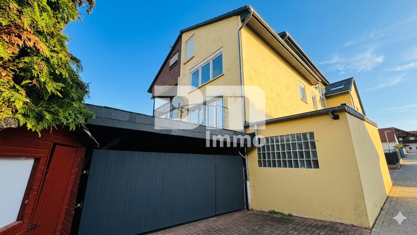 Vielseitiges Immobilien-Ensemble mit 2 modernisierten Haushälften + Carport und Garten/Terrasse – Northeim – Vorschaubild 3