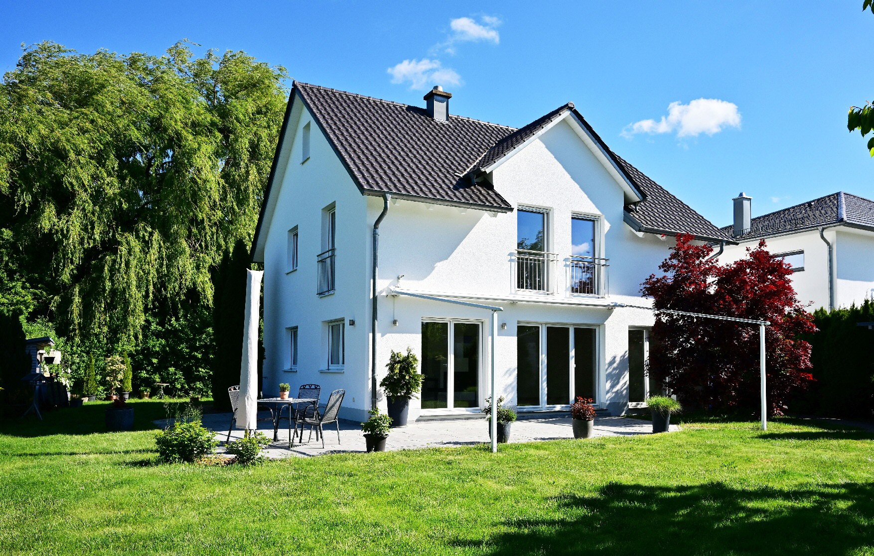 AIGNER - Hochwertiges Einfamilienhaus mit traumhaften Garten – Eurasburg – Bild 1 von 13